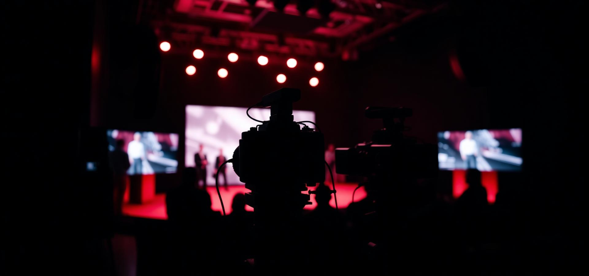 Television cameras filming a live broadcast